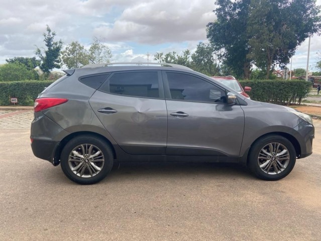 Venda Tucson impecável